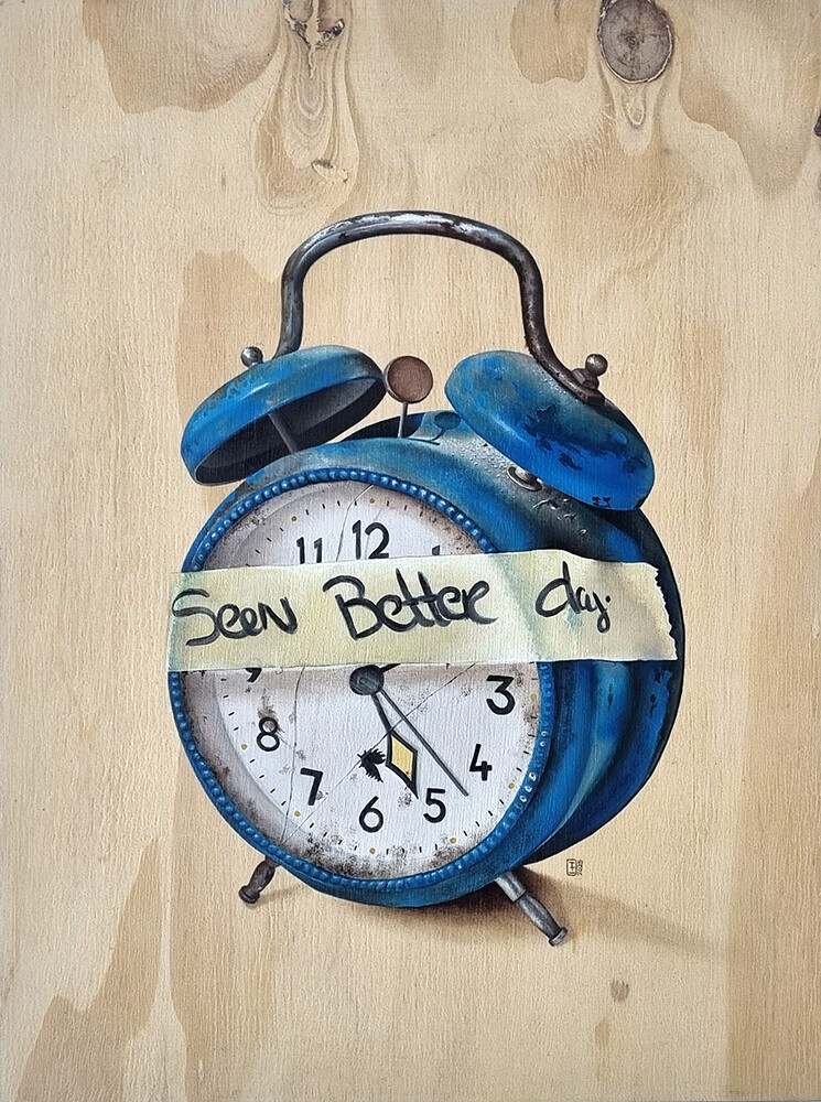 Seen better day An oil painting of a broken, blue alarm clock on a pine panel. The alarm clock has a piece of tape over it that says seen better day.