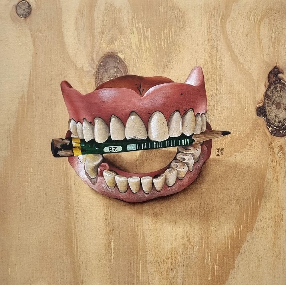 The Grind Oil painting of false teeth with a chewed 2B pencil between the teeth. Painted on sealed pine board.